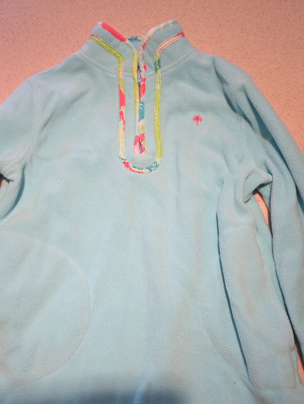 Lilly Pulitzer Girls pastel blue fleece top with pink label